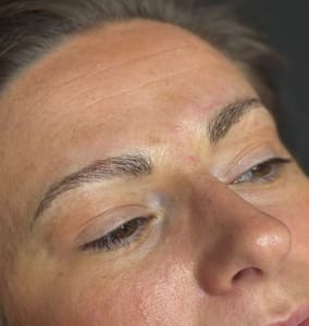 Eyebrow Tattoo result by Powder and Mist Permanent Make Up & Esthetics in Fayetteville, NC