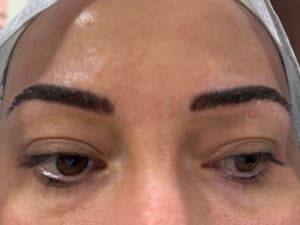 Eyebrow Tattoo result by Renu Xpert Esthetics in Sterling, VA