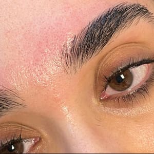 Eyebrow Tattoo result by Renued Brow Lamination + Lash Lift Studio in Falls Church, VA