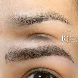 Eyebrow Tattoo result by RJ Brows Aesthetics in Cypress, TX
