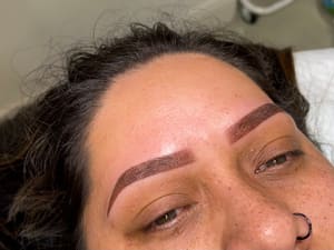 Eyebrow Tattoo result by Roas Beauty Inc. in West Park, FL