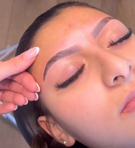 Eyebrow Tattoo result by Salon Pakxe Nails & Beauty Collective in Eden Prairie, MN