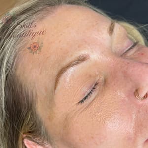 Eyebrow Tattoo result by Shell's Beautique in Jenison, MI