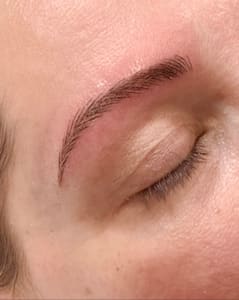 Eyebrow Tattoo result by Skincare Brows Lashes in Ridgewood, NY