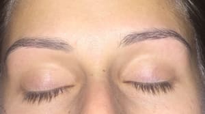 Eyebrow Tattoo result by The Beauty Bar Thread and Wax in Novi, MI