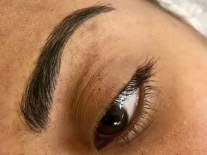 Eyebrow Tattoo result by TIAN Permanent Makeup and MicrobladingTraining Studio in Davie, FL