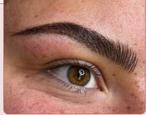Eyebrow Tattoo result by Tin Kitten Beauty Bar – Cosmetic Tattoo - Salon Team - Creative Stations in Apple Valley, CA