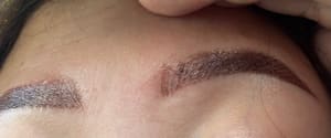 Eyebrow Tattoo result by TLe Beauty Studio & Academy in Cypress, TX