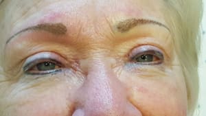 Eyebrow Tattoo result by Touch of Bliss Salon & Spa in Dewitt, IA
