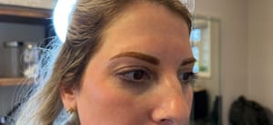 Eyebrow Tattoo result by Truc Beauty Artistry in Fairview, TN