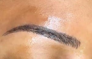 Eyebrow Tattoo result by Uniq Radiance Salon in Duncanville, TX