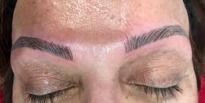 Eyebrow Tattoo result by United Nails & Eyelash LLC in Centennial, CO