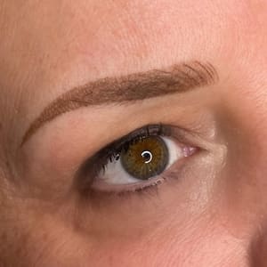 Eyebrow Tattoo result by Wink Permanent Makeup and Lashes in Plover, WI