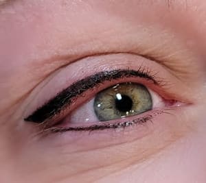Eyeliner Tattoo result by Alluring Artistry LLC in Madison, WI
