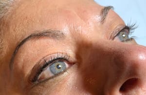 Eyeliner Tattoo result by Beauty Mark Permanent Makeup (Inside Bronzed N Beautiful) in Overland Park, KS