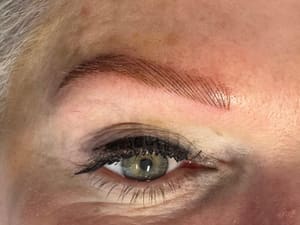 Eyeliner Tattoo result by Bella. Brow Threading Salon in Omaha, NE