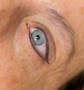 Eyeliner Tattoo result by Habit Permanent Cosmetics and Lash Lounge (Jefferson City MO) in Jefferson City, MO
