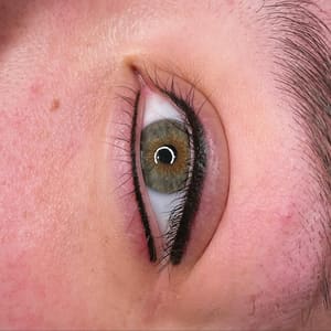 Eyeliner Tattoo result by Mandee Best Permanent Cosmetics & Piercings in Alliance, NE