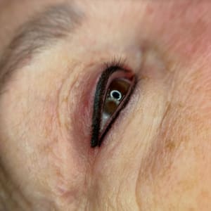 Eyeliner Tattoo result by Mandee Best Permanent Cosmetics & Piercings in Alliance, NE