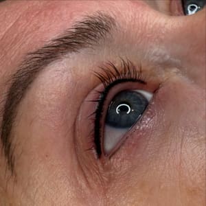 Eyeliner Tattoo result by Mandee Best Permanent Cosmetics & Piercings in Alliance, NE