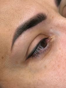 Eyeliner Tattoo result by SLG Beauty Empire by Larisa Gurau in Plainfield, IL