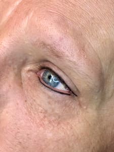 Eyeliner Tattoo result by Snow Queen Studios in Lowville, NY