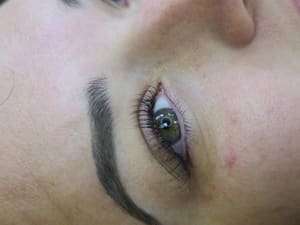 Eyeliner Tattoo result by The Main Character Cosmetic Tattoo & Lashes by Kirstin in Palmyra, MO