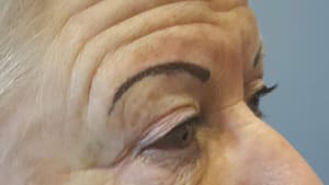 Eyeliner Tattoo result by Touch of Bliss Salon & Spa in Dewitt, IA